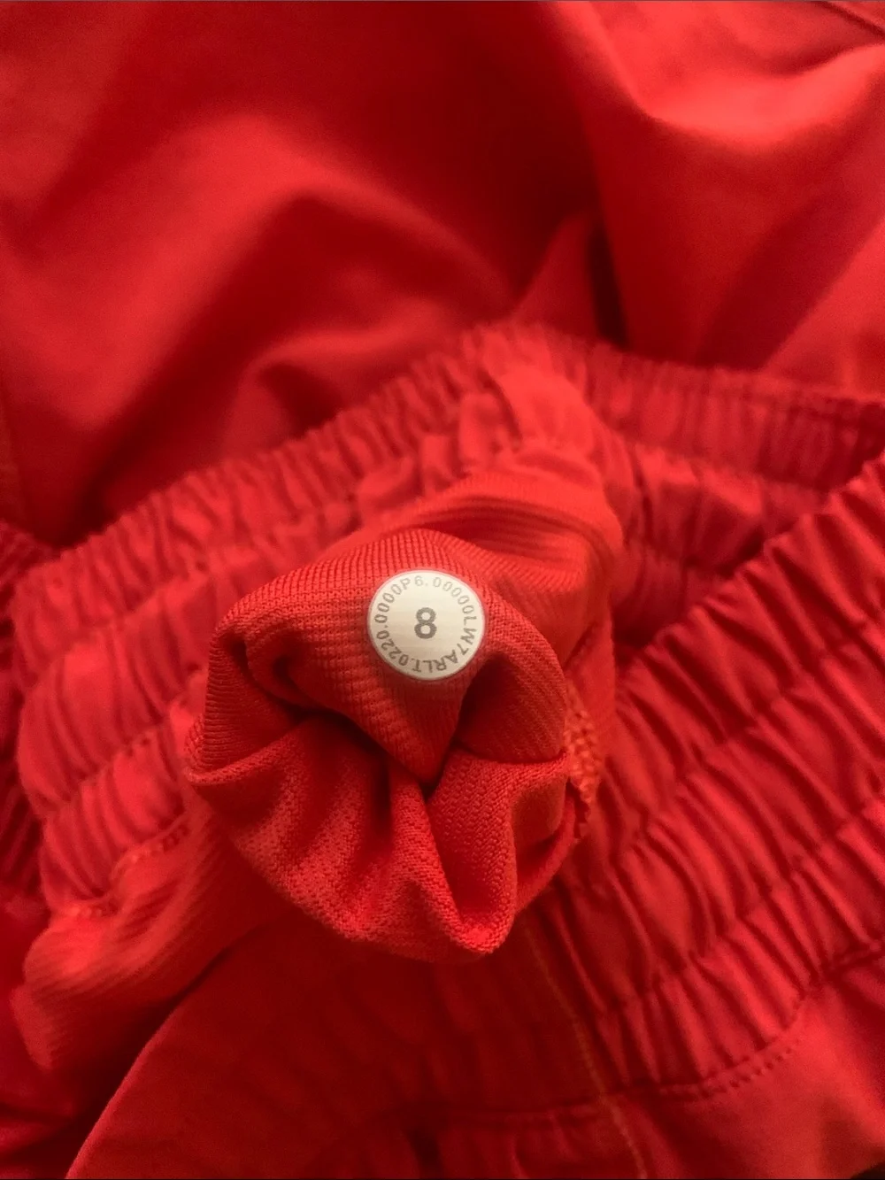 Lululemon Carnation Red Hotty Hot Shorts 4in Sz 8, GUC, 1 pin hole in the back